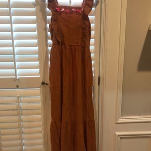 Brown linen style childrens dress with gold specks